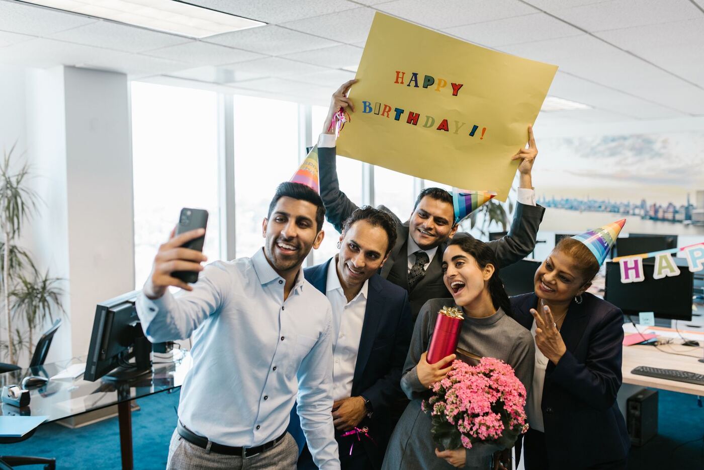 A team celebrating an anniversary