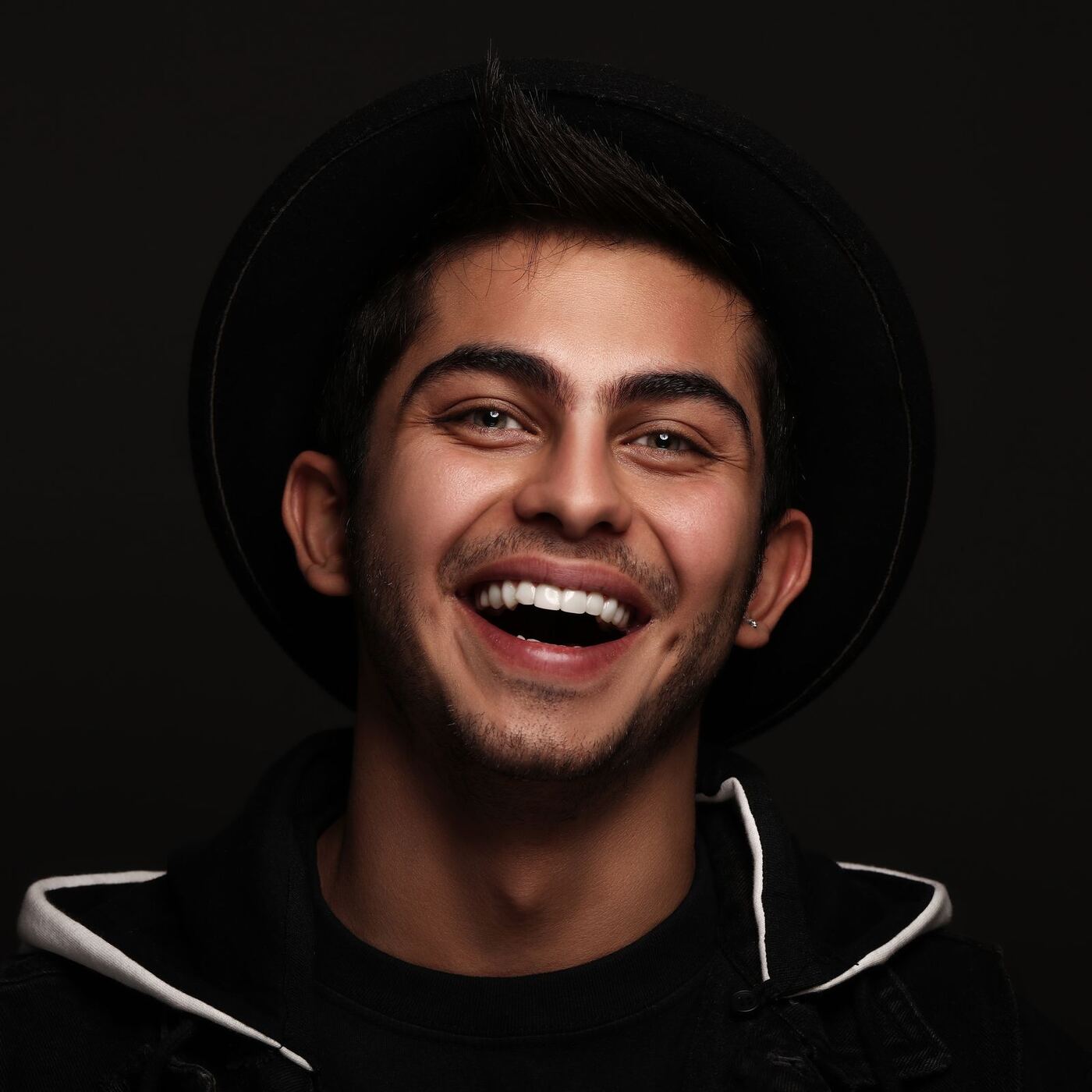 A smiling person expressing happiness